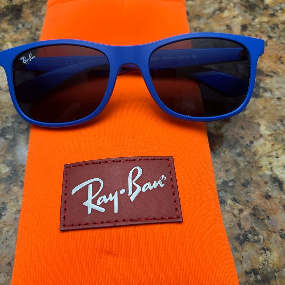 Ray Ban kids blue sunglasses with black lenses and orange RayBan case